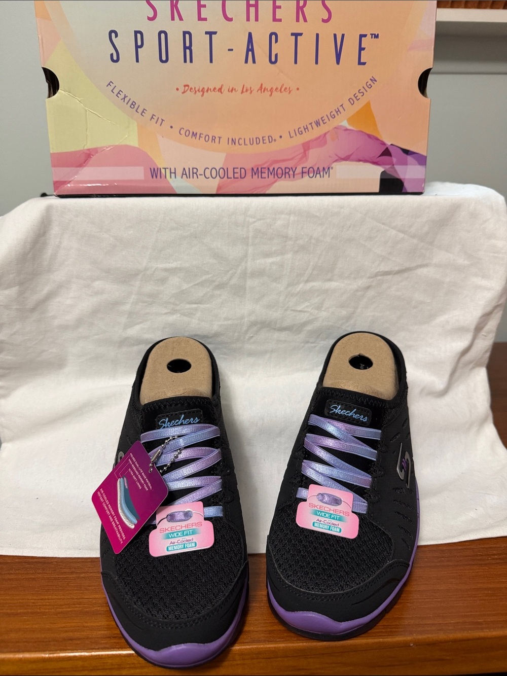 Skechers Black Sneakers with Purple Accents — Women’s Slip-On Athletic Shoes
